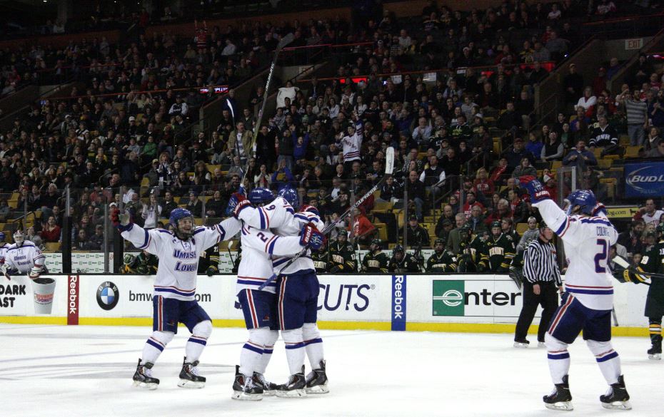 The River Hawks celebrate after Terrence Wallin's goal in the third period gives the team a 3-1 lead.