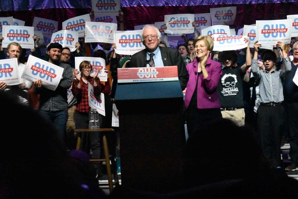 Senators Sanders and Warren standing side-by-side