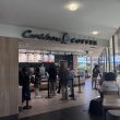 UMass Lowell students waiting in line to order drinks and snacks at Caribou Coffee